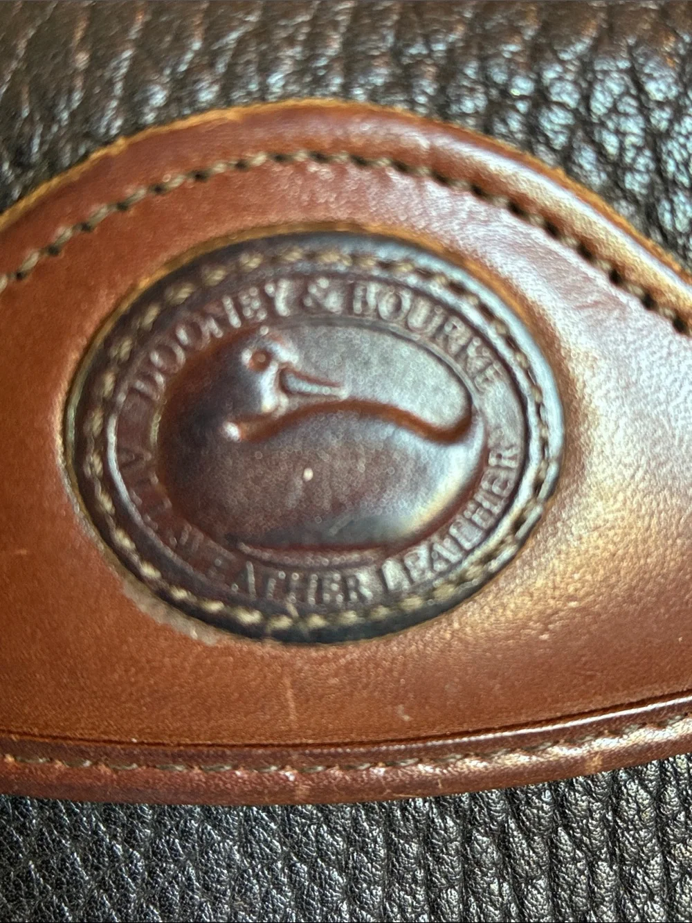 Dooney & Bourke wallet 1  Black Pebbled Leather Wallet with Brown Trim GUC